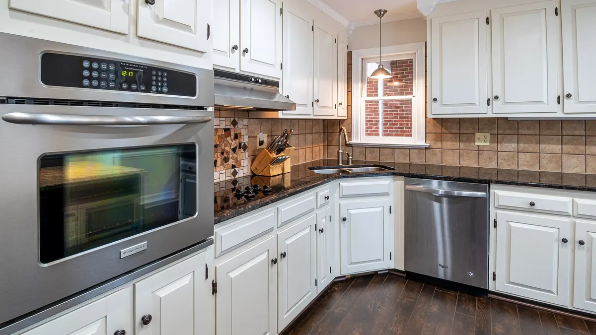 White painted kitchen cabinets with modern hardware