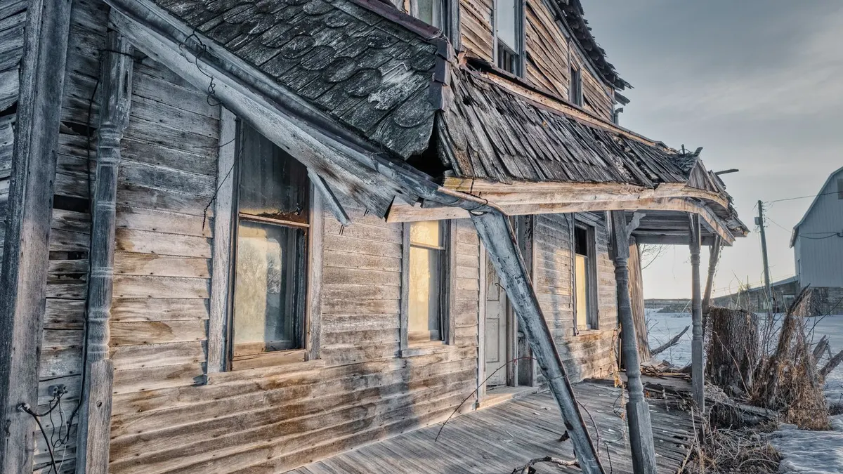 Exterior of a house showing uneven paint fading from sun exposure