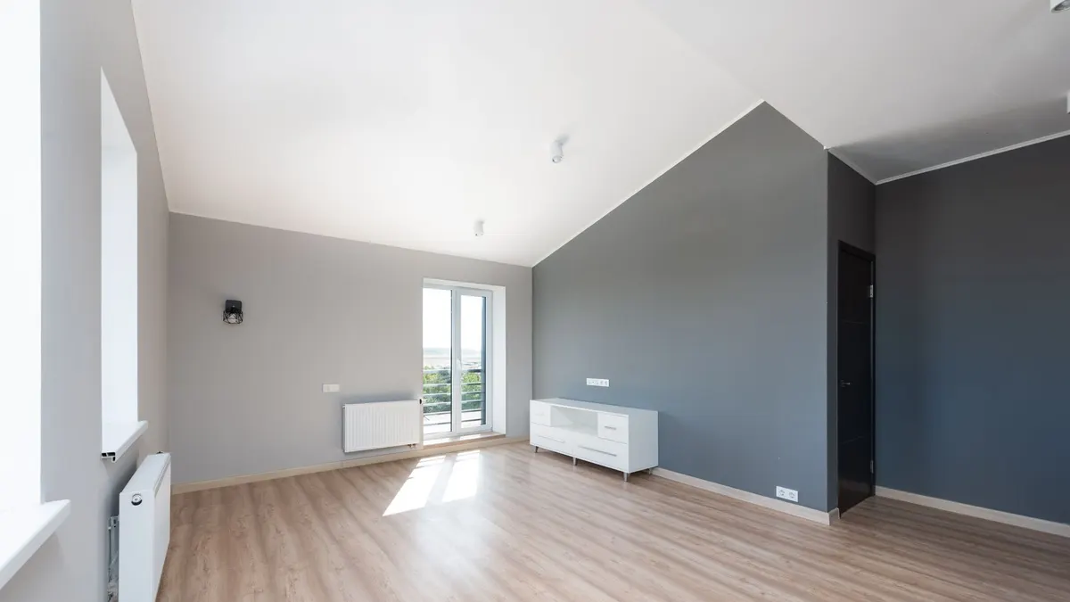 Freshly painted living room with clean, even walls